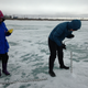 Researchers use an auger to drill into the sea ice off Barrow, Alaska. After drilling a hole, they use a tape measure to record ice thickness. Image: W. Meier, NASA